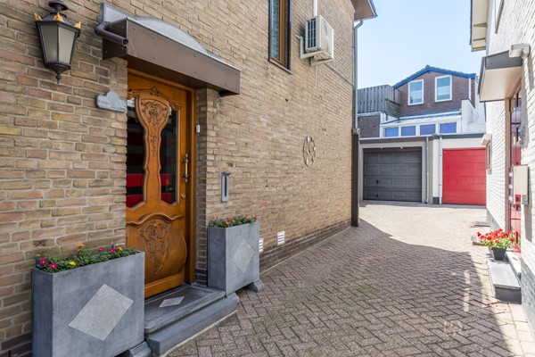 Foto - Verkocht onder voorbehoud: Nette twee- onder- een – kapwoning met serre, zonnige tuin en garage in Bocholtz